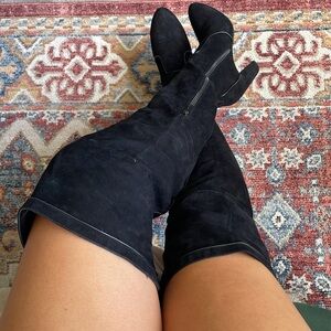 Thigh high black faux suede boots from JustFab. 3.5 inch heels.